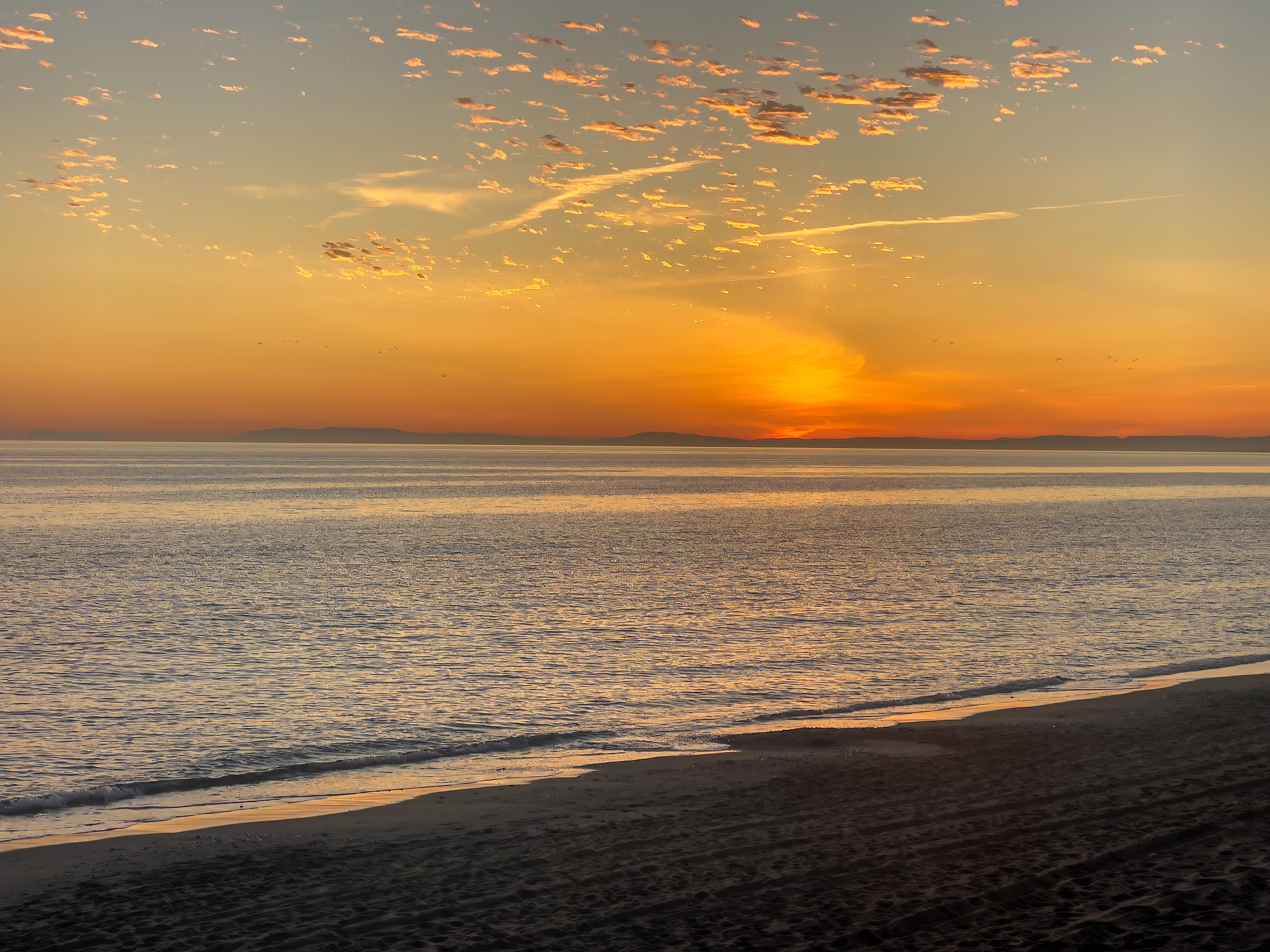 Puesta de Sol en playa del Alicate.